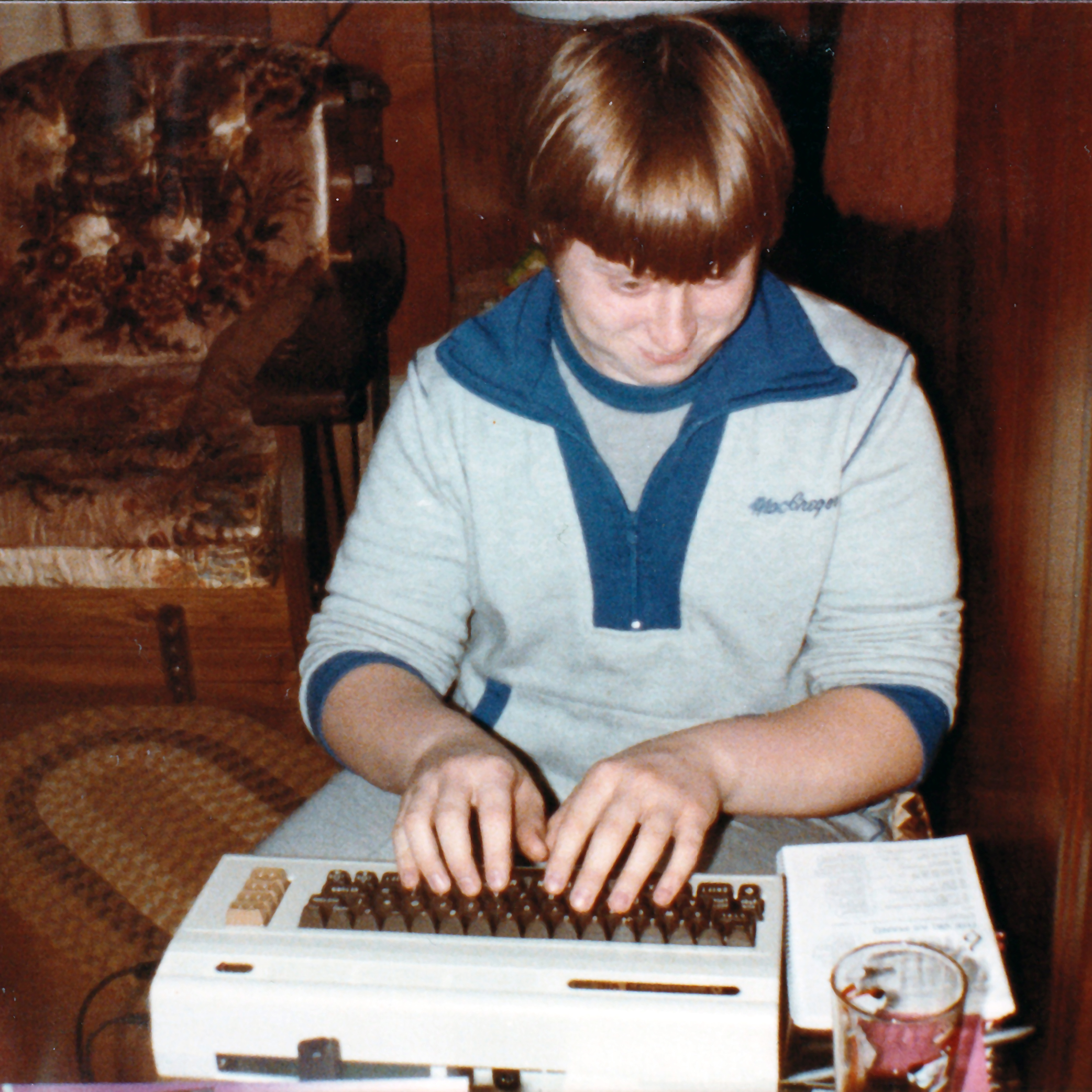 Photo of young Walter coding on his VIC-20